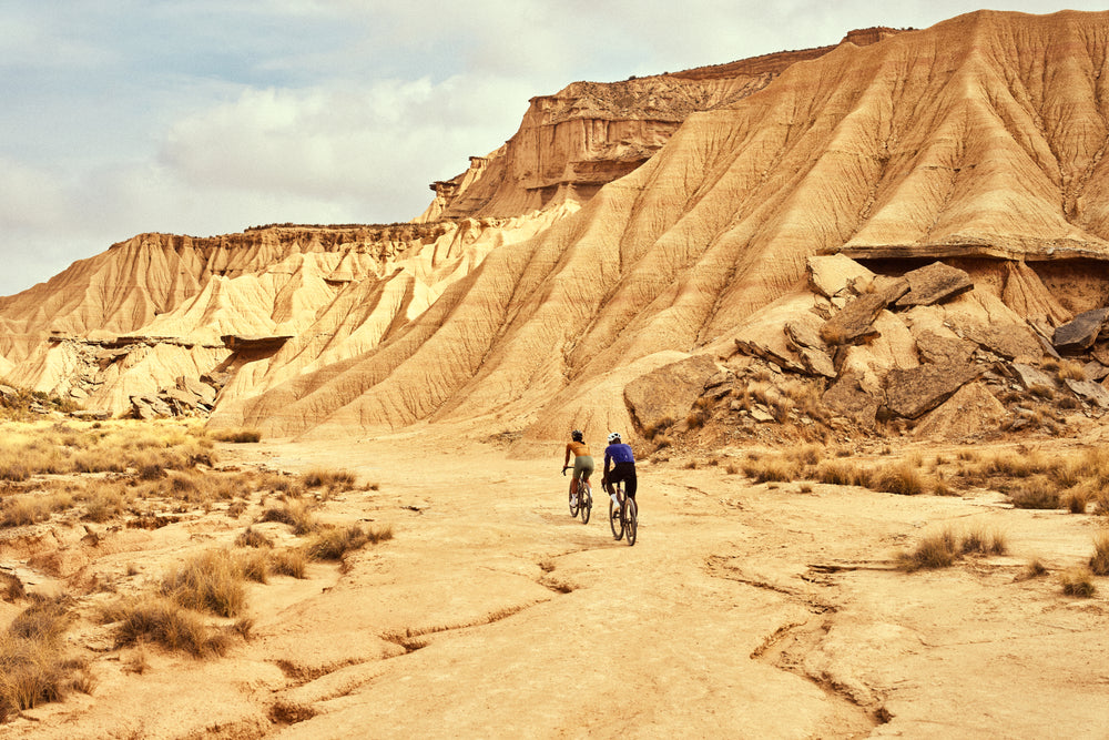 dura2-desert: Riders in a desert canyon